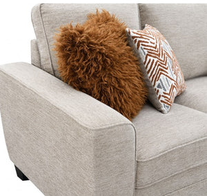 Erna Taupe Chenille Fabric Sofa Gray sofa with a brown fluffy pillow and a patterned pillow on a white background