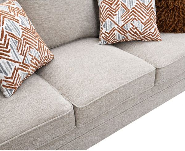 Erna Taupe Chenille Fabric Sofa Gray sofa with patterned cushions on a white background