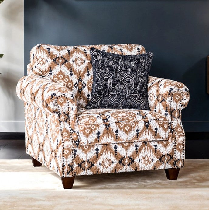 Erni Light Gray Fabric Accent Chair With Pillows Patterned armchair with a dark pillow against a neutral wall.