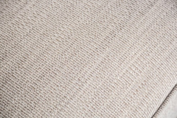 Erni Light Gray Fabric Sofa With Pillows Close-up of textured beige fabric