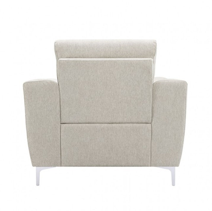Estrella Light Taupe Brown Slope Flair Arm Chair A modern upholstered armchair in a light beige textured fabric, set in a minimalist room with beige walls, arched recesses, and light wood floors.