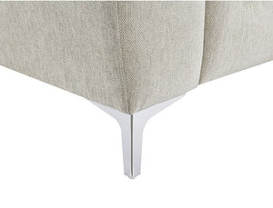 Estrella Light Taupe Brown Slope Flair Arm Chair Close-up of a light beige herringbone upholstered furniture corner with a slim silver metal leg on a white background.