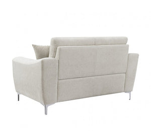 Estrella Light Taupe Brown Slope Flair Arm Loveseat A modern two-seater sofa upholstered in a light beige textured fabric, featuring slim silver metal legs and a matching throw pillow, shown from a three-quarter rear angle on a white background.