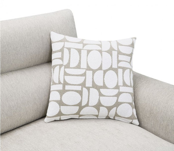 Estrella Light Taupe Brown Slope Flair Arm Loveseat A square throw pillow with a white and light beige geometric pattern, resting on a light gray fabric sofa against a white background.