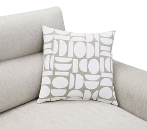 Estrella Light Taupe Brown Slope Flair Arm Sofa A square throw pillow with a white and beige geometric pattern, resting on a light gray fabric sofa against a white background.