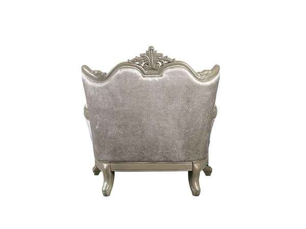 Ethaan Button Tufted Traditional Fabric Chair A single upholstered armchair shown from the back, featuring a silver damask-patterned fabric and ornate silver carved wooden arms and legs, isolated on a white background.