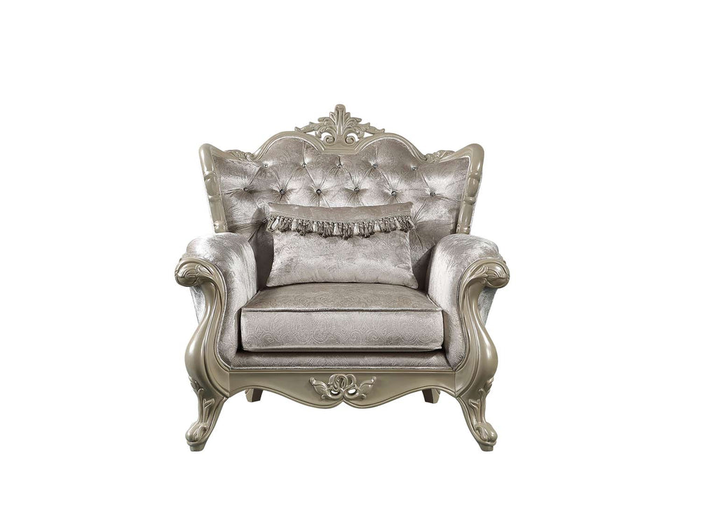 Ethaan Button Tufted Traditional Fabric Chair Silver ornate armchair in a room with white curtains and a plant.
