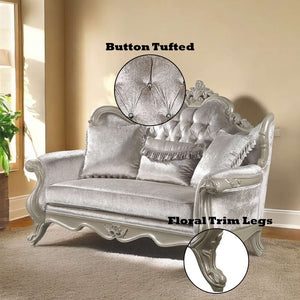 Ethaan Button Tufted Traditional Fabric Loveseat Silver button tufted sofa with floral trim legs in a room setting.