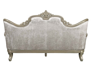 Ethaan Button Tufted Traditional Fabric Sofa An ornate upholstered bench or sofa backrest with a distressed silver-gray velvet fabric and a matching carved wooden frame, shown against a plain white background.
