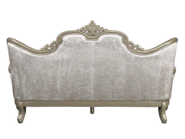 Ethaan Button Tufted Traditional Fabric Sofa An ornate upholstered bench or sofa backrest with a distressed silver-gray velvet fabric and a matching carved wooden frame, shown against a plain white background.