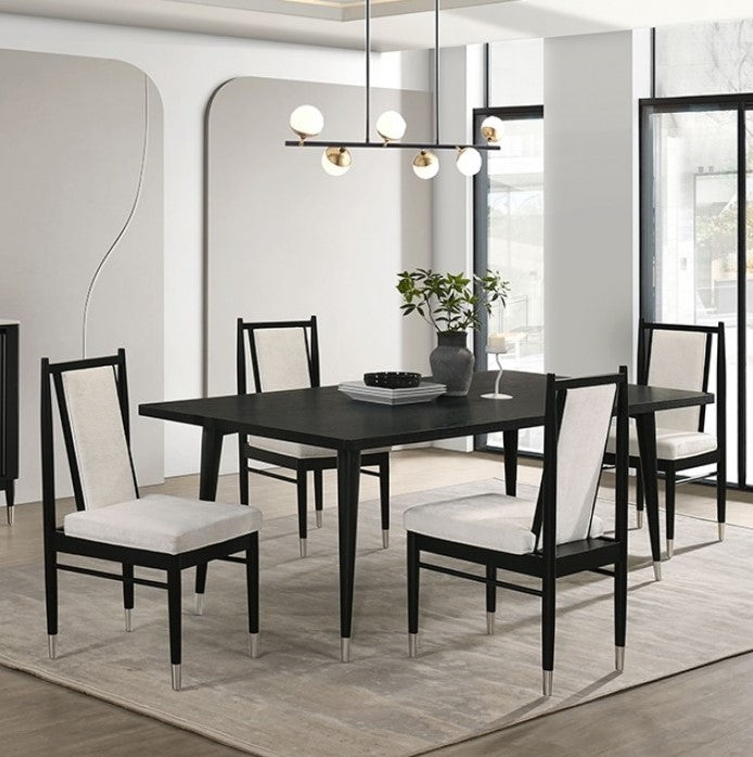 Dining room with a black table and chairs with white cushions in a modern interior.