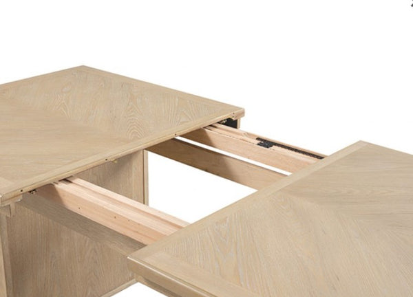 Ezera Natural Extendable Dining Table Wooden table with a folding leaf on a white background