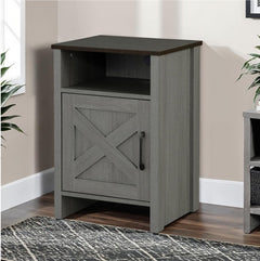 Gabby Rustic Farmhouse Two Tone Side Table Wooden side table with a barn door design in a room setting.