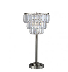 Genna Hanging Crystal Table Lamp A modern table lamp with a brushed silver metal stand and a tiered crystal chandelier shade on a white background.
