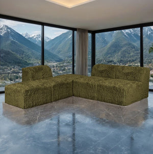 #Green Giacinto Compressed Foam Modern L-Sectional Sofa Green Finish Green sectional sofa in a modern room with large windows overlooking mountains.