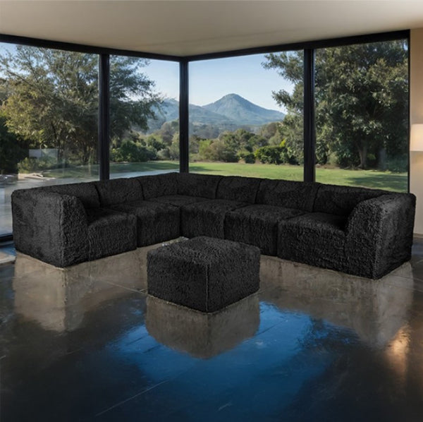#Black  Giacinto Compressed Foam Modern L-Sectional Sofa Black Finish Modern black sectional sofa in a room with large windows overlooking greenery and mountains.