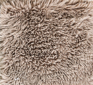 #Taupe  Giacinto Compressed Foam Modern L-Sectional Sofa Taupe Finish Close-up of a beige, fluffy rug with a textured surface.