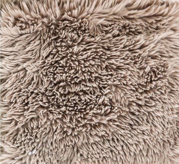 #Taupe  Giacinto Compressed Foam Modern L-Sectional Sofa Taupe Finish Close-up of a beige, fluffy rug with a textured surface.