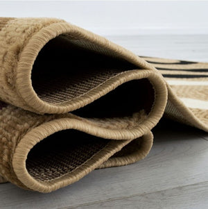 Glitur 5x7 Contemporary Polyester Brown Area Rug Brown textured rug on a light wooden floor