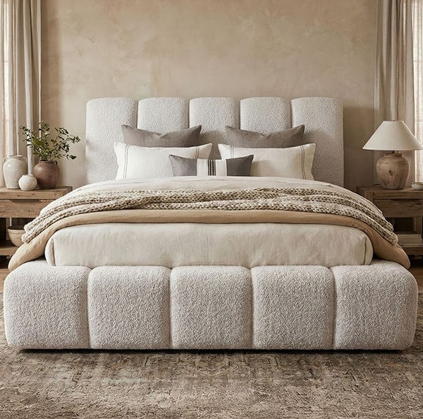 Gmarc Modern Style Quartz White Upholstery Bed Neatly made bed with decorative pillows and blankets in a bedroom setting.