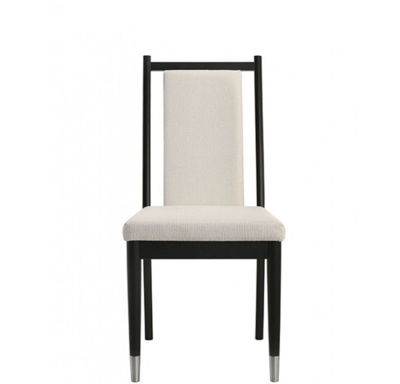 Grayson Contemporary Black White Fabric Chair Black dining chairs with cream upholstered seats and backrests, shown in a dining room setting next to a glass-top table.