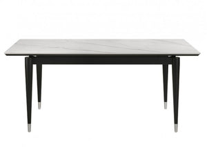 Grayson Contemporary Black White Sintered Stone Top Dining Table A modern rectangular dining table with a white marble-look top featuring subtle gray veining and a black metal frame with tapered legs.