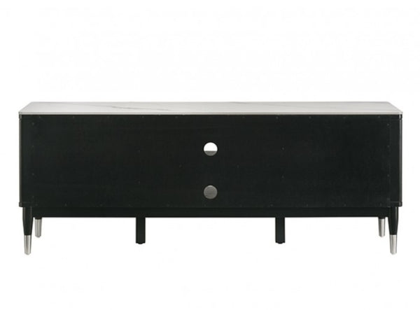 Grayson Contemporary Black White Sintered Stone Top TV Console A modern black console table with a single drawer, featuring a light gray marble top and slim tapered legs with silver metal tips, shown against a plain white background.