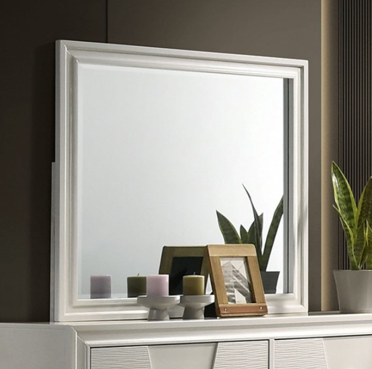 Hailly Trapezoid Mirror With White Finish Framed mirror on a wall with decorative items and plants