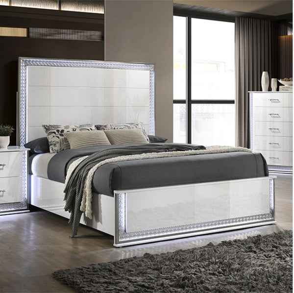 Hailry Glam Modern High Gloss White Finish Bed Modern bedroom with a bed featuring a decorative headboard and gray bedding.