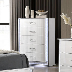 Hailry Glam Modern High Gloss White Finish Chest White dresser with decorative items in a bedroom setting