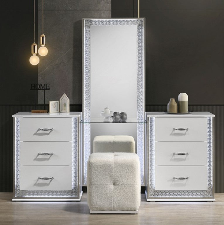 Hailry Glam Modern High Gloss White Finish Vanity Set Pair of mirrored nightstands with decorative elements in a modern bedroom setting.