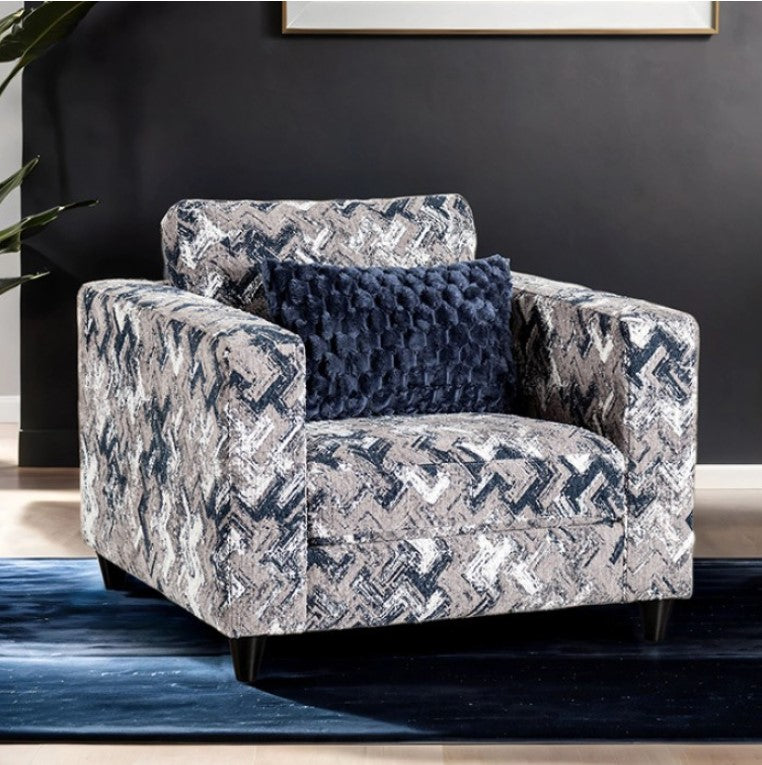 Harrold Light Gray Transitional Style Chair Patterned armchair with a textured blue pillow on a dark gray wall background