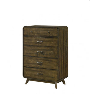 Wooden dresser with four drawers on a white background