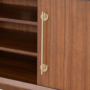 Wooden cabinet with brass handle