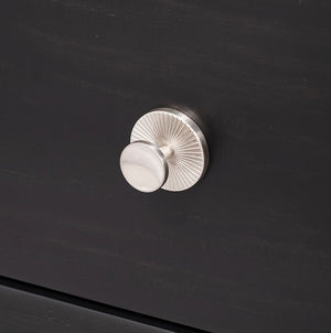 Hermin Modern Style Nightstand Black Close-up of a black cabinet with a silver handle