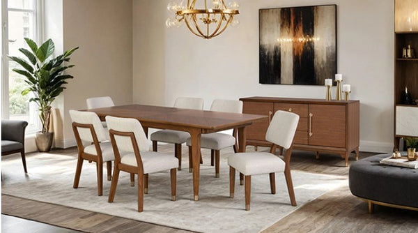 Dining room with wooden table and chairs, sideboard, and artwork on the wall.
