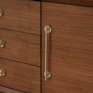Wooden cabinet with metallic handles