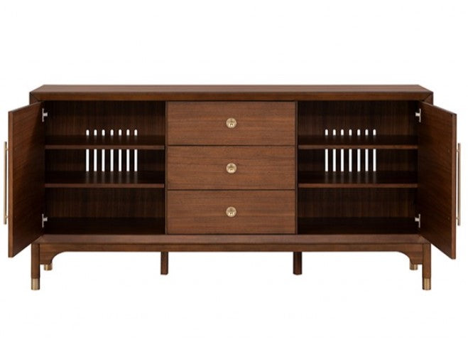 Hermin Modern Walnut Server Wooden sideboard with decorative items in a room with a painting on the wall.