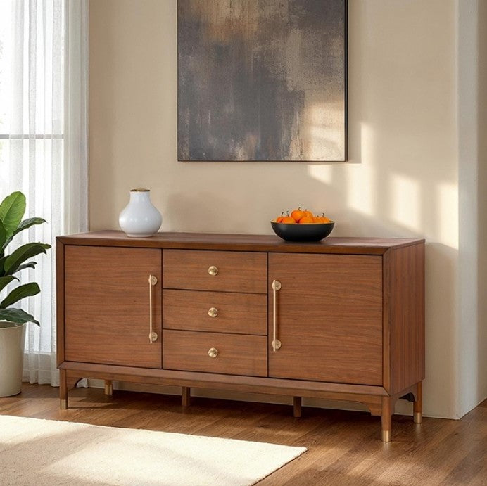 Hermin Modern Walnut Server Wooden sideboard with decorative items in a room with a painting on the wall.