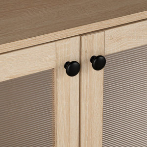 Idahos Mid Century Modern Natural TV Stand Close-up of wooden cabinet doors with black knobs