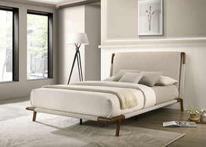 Jenni Bed Mid Century Modern Beige Fabric Modern bedroom with a bed, lamp, and decor items.