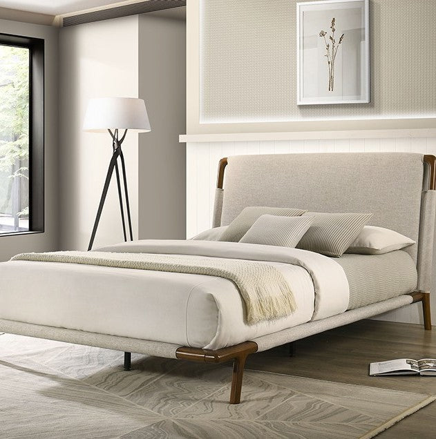 Jenni Bed Mid Century Modern Beige Fabric Modern bedroom with a beige upholstered bed and wooden legs.