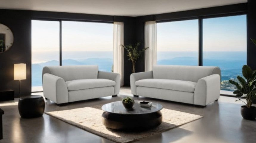 Karl Gray Contemporary Chenille Fabric Chair Gray armchair in a modern living room with large windows and a mountain view.