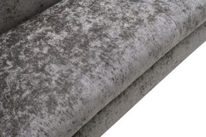 Karl Light Gray Contemporary Chenille Fabric Sofa Close-up of a textured gray stone surface