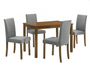 Kelsh Straight Leg 44" Dining Table Dining table set with four gray chairs on a white background