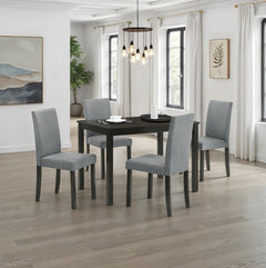 Kelsh Straight Leg Espresso 44 Dining Table Dining room with a black table and gray chairs in a well-lit room.