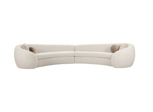 Kilmer Off White Fabric Curved Modern Sectional Sofa A curved modular upholstered sofa in a light beige fabric, featuring two rounded armrests and two small round accent pillows, shown against a plain white background.