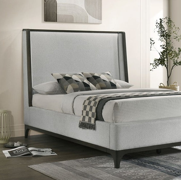 Kladirmen Wingback Panel Fabric Upholstered Bed Gray upholstered bed with checkered blanket and pillows in a bedroom setting.