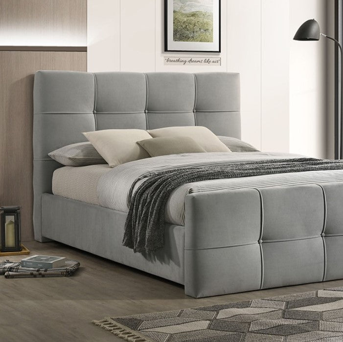Koall Light Gray Fabric Biscuit Button Tufting Bed Gray upholstered bed with pillows and a blanket in a bedroom setting.