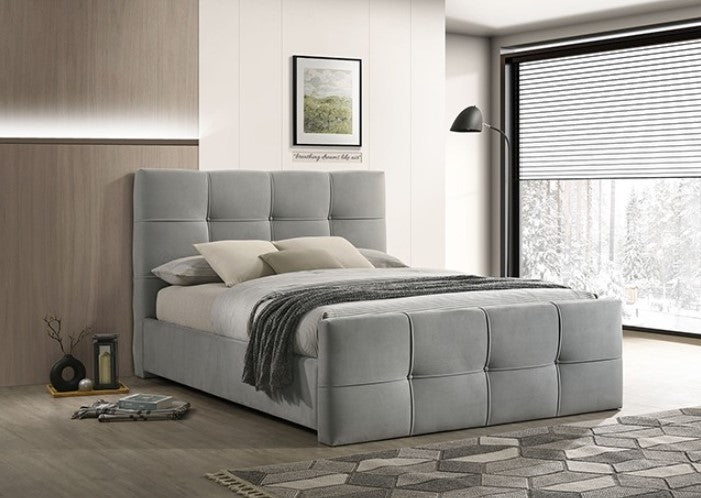 Koall Light Gray Fabric Biscuit Button Tufting Bed Gray upholstered bed with pillows and a blanket in a bedroom setting.